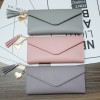 Spring / summer 2018 new long style hand holding trendy heart-shaped pendant simple fashion multifunctional litchi pattern women's purse 