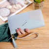 New women's handbag wallet women's long Korean color contrast splicing zipper tassel large capacity wallet mobile phone bag 