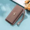 Factory supply wholesale women's leisure three fold multifunctional handbag direct selling fashion buckle zipper mobile phone bag 