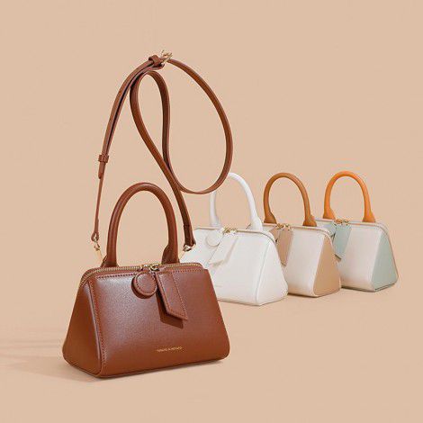 Genuine leather women's bag, crossbody bag, high-end mobile phone bag, commuting small bag, exquisite niche design, triangle bag, handbag 