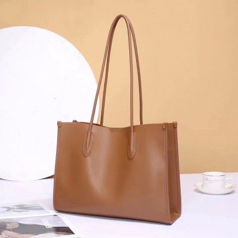 Genuine leather tote bag, new niche cowhide soft leather bucket bag, commuting bag, shoulder bag, women's large capacity, versatile 