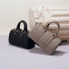 Featuring a niche design, the top layer cowhide retro style handbag exudes a sense of luxury, fashion, and versatility, making it a versatile crossbody bag 