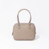 Minimalist and sophisticated retro hand pillow bag for women's commuting versatile leather feather bag 