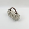 Minimalist wooden handle pleated cloud carrying handbag for women's crossbody mini bag 